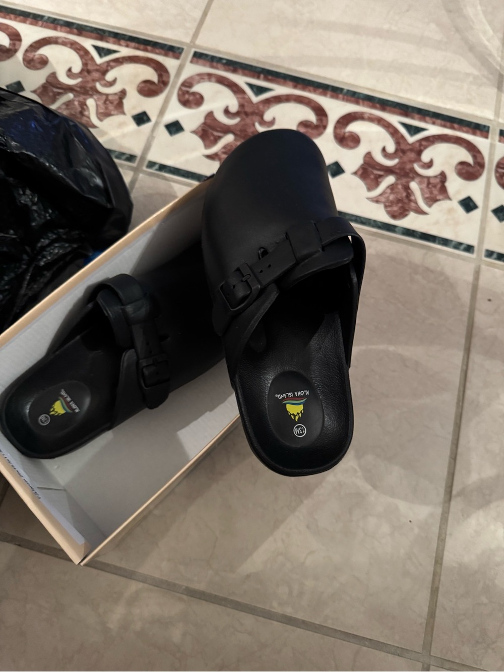 Classic Black Slip-On Clogs with Adjustable Strap